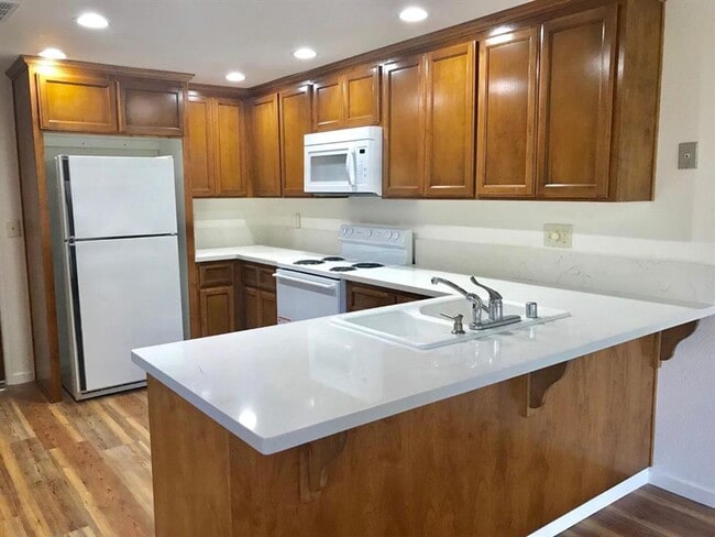 Building Photo - Beautifully Updated 2 Bed 1.5 Bath Condo in Merced Gated Community - Private Backyard! Community ...