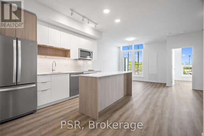 Photo du bâtiment - 4235-4235 Confederation Pkwy