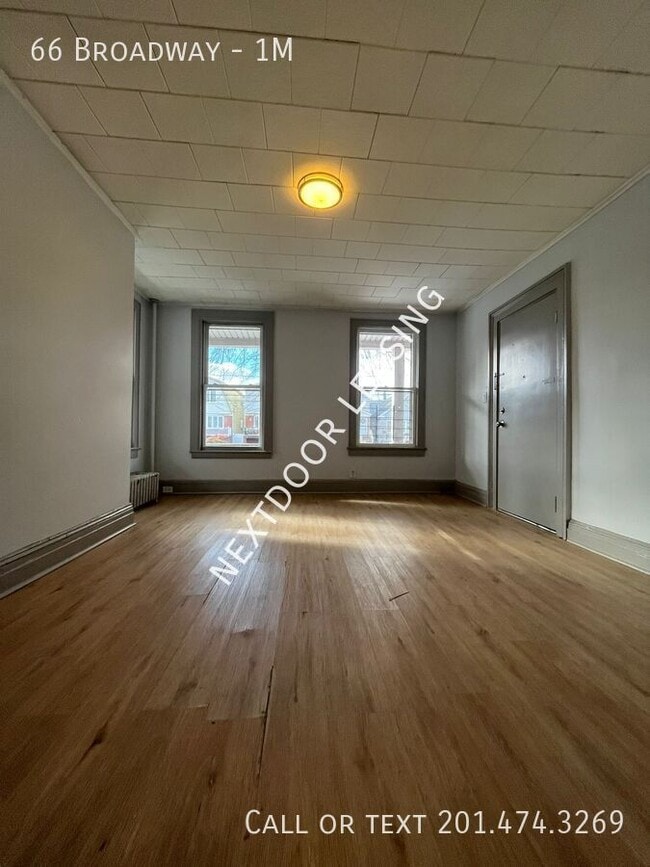 Foto del edificio - 66 Broadway-1M