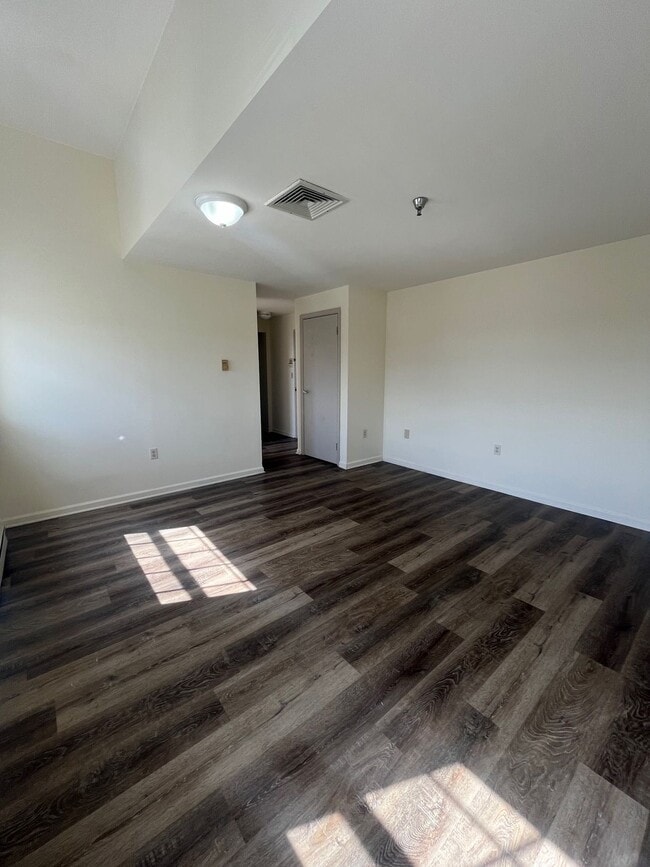 Unit 211 Living Room - Woodlayne Court Apartments