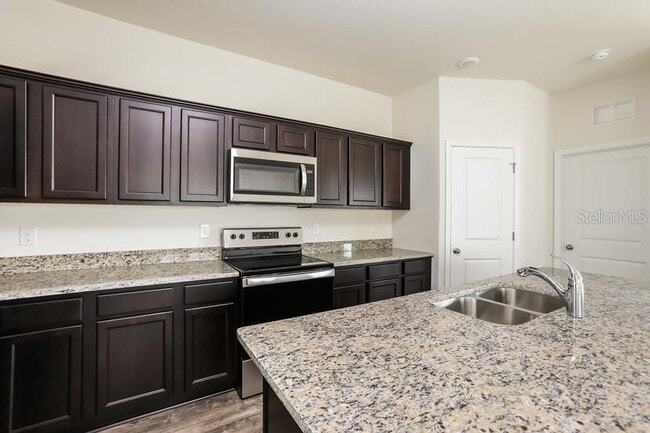 Building Photo - 3077 Neverland Dr