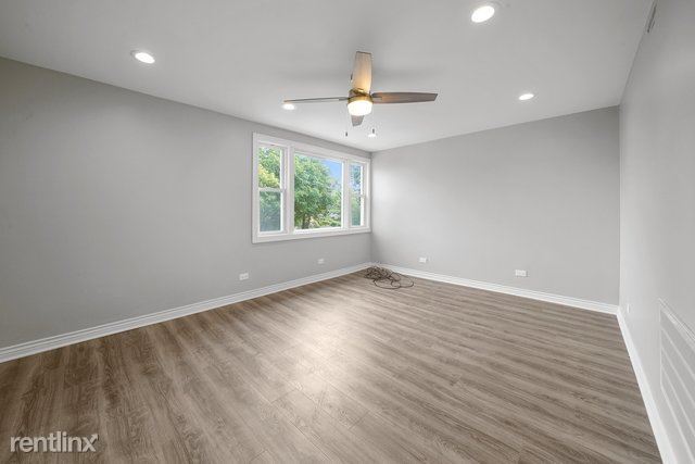 Building Photo - 3 br, 1 bath Condo - 3807 W Eddy St Unit 2