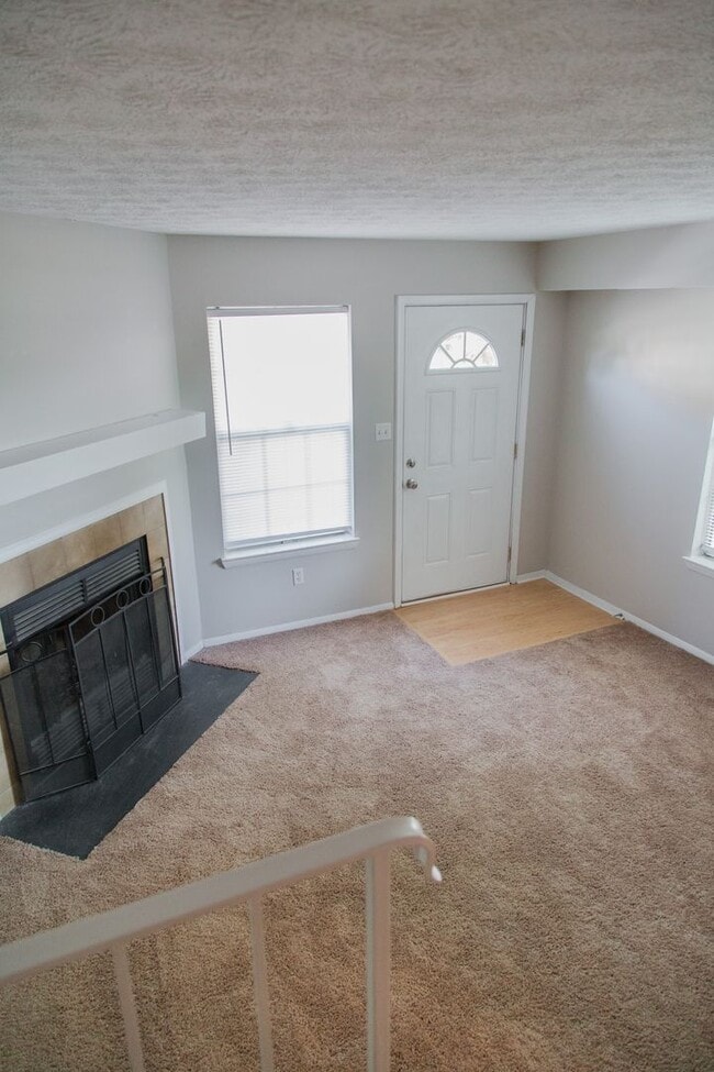 Building Photo - Enjoy Freshly Painted Open Floor Plan!