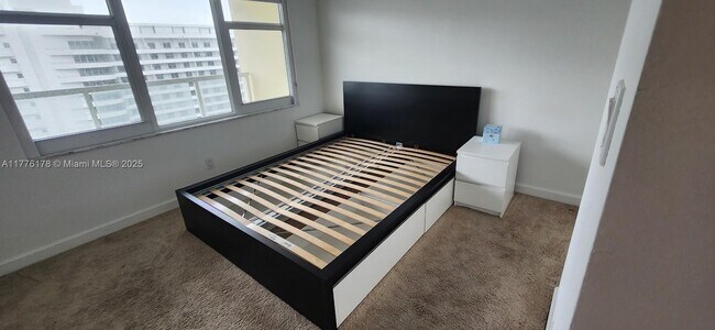 Building Photo - 5600 Collins Ave