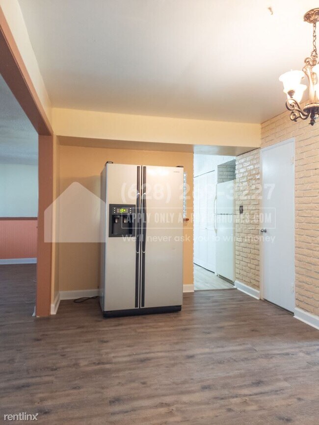 Building Photo - 4 br, 2.5 bath House - 7711 Queens Park Ro...