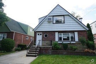 Building Photo - 203-12 42nd Ave