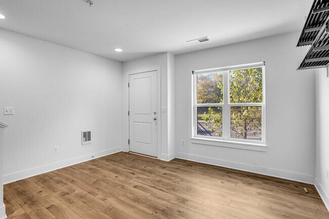 Photo - Spacious 4-level Home| 3 bedrooms + Garage parking!