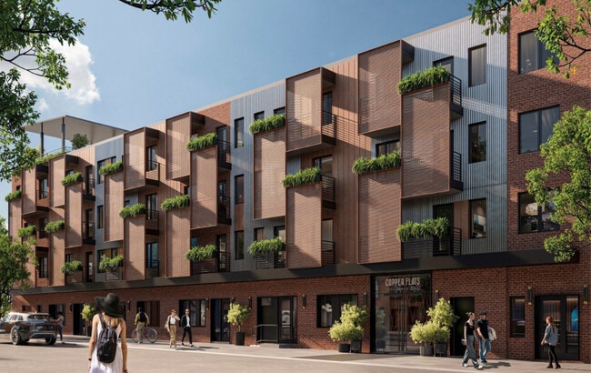 Stylish balconies shaded by corten steel sun screens - Copper Flats Apartments