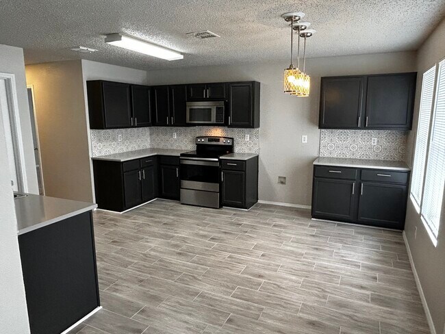 Foto del edificio - 8720 Hunters Creek Dr
