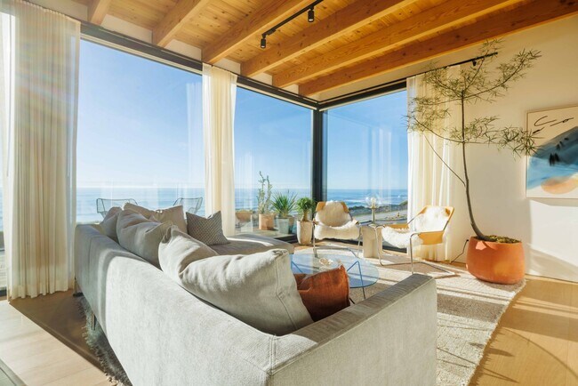 Building Photo - Fully Furnished, Modern Coastal Luxury wit...