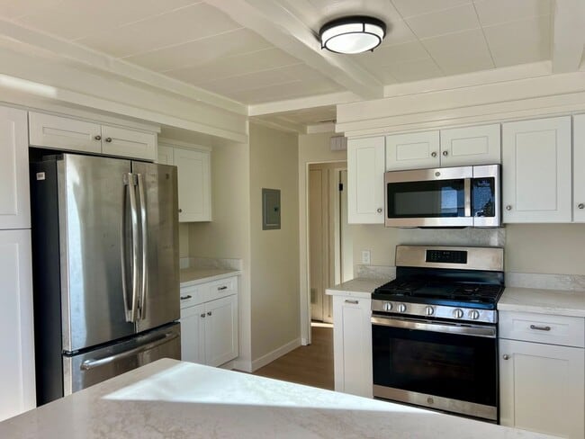 Building Photo - Lovely corner lot home in throwing distance to popular Parkside Montessori home with lots of natu...