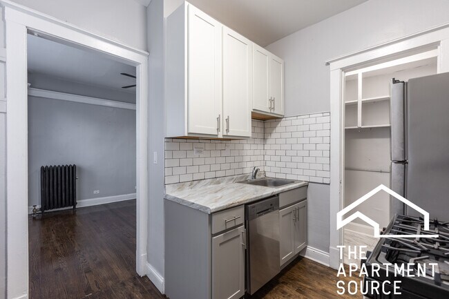 Foto del edificio - 6251 N Lakewood Ave