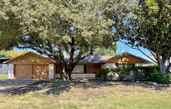 Building Photo - 5908 Wedgmont Cir N