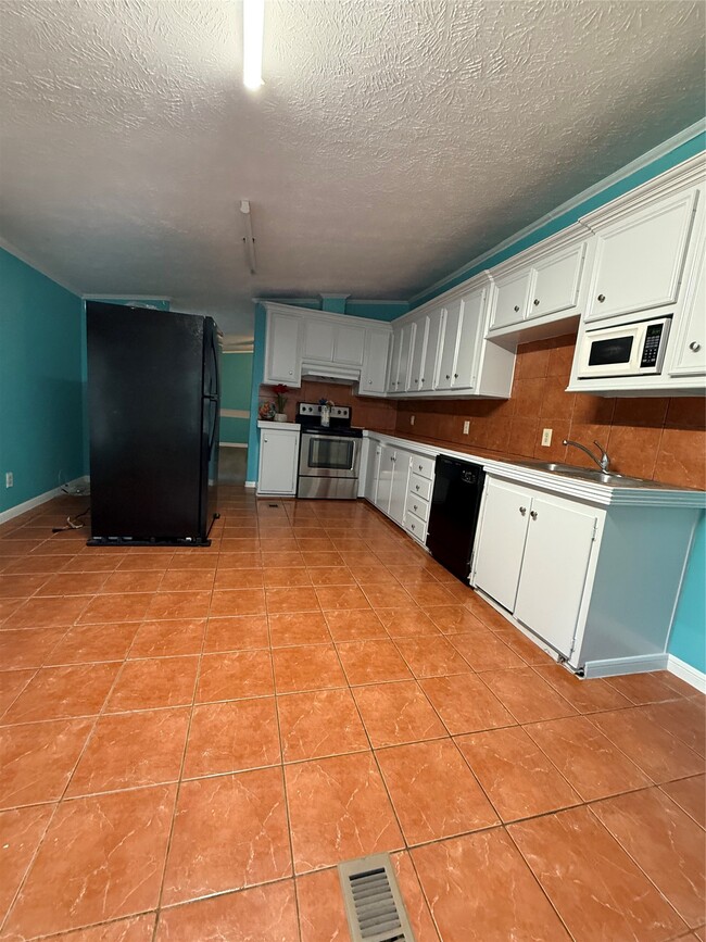 Foto del edificio - 4440 Grand Oaks Dr