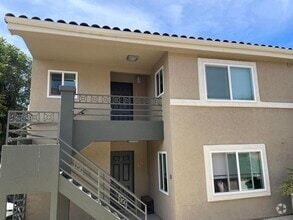 Building Photo - 7565 Charmant Dr
