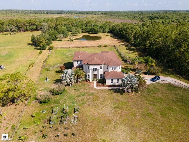 Building Photo - 4 br, 3.5 bath House - 29501 Saddlebag Trail