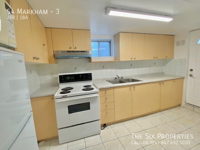 Photo du bâtiment - Bright 2 Bedroom Apartment
