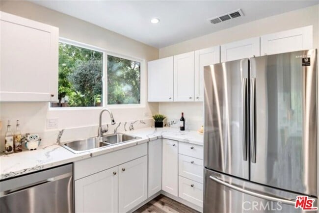 Building Photo - 17902 Saticoy St