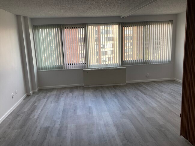 Open Space with Vertical Blinds - 1330 New Hampshire Ave NW
