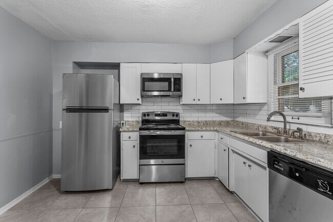 Foto del edificio - 9104 Richards Dr