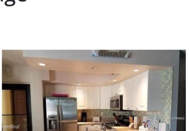 Building Photo - 1700 Pass a Grille Way