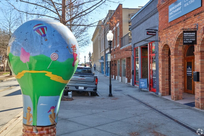 Brightly painted light bulbs are found in teh Spartanburg downtown area.
