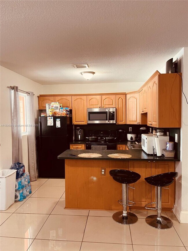 Foto del edificio - 5857 NW 13th Ave