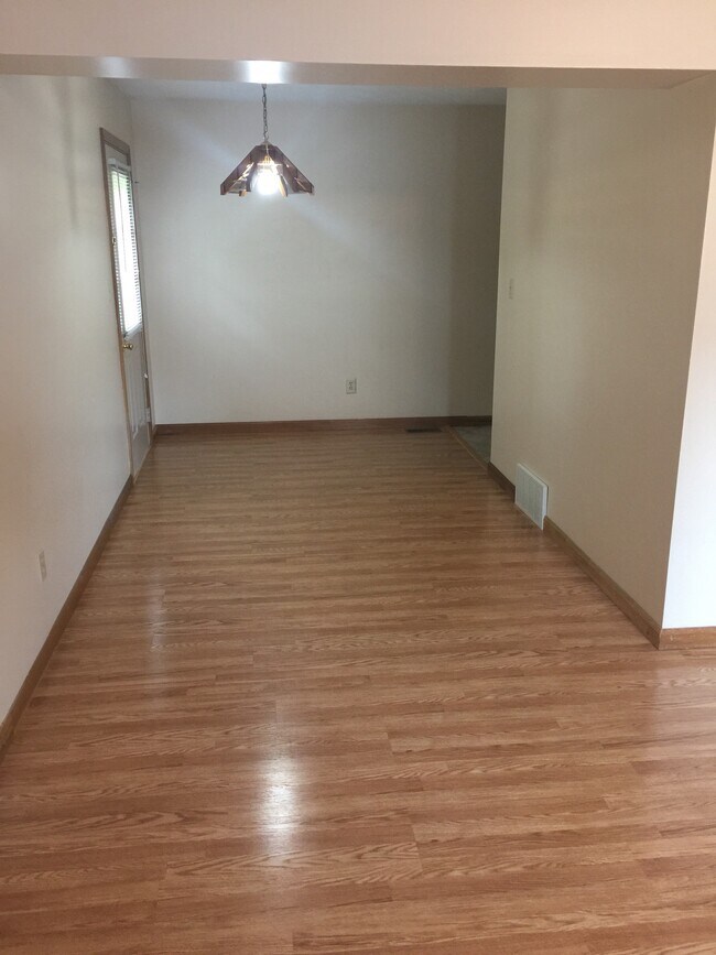 Dining Area leading to kitchen and rear door - 1907 Morecott Dr