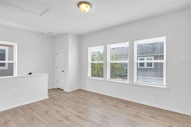 Building Photo - 8558 Tavistock Lakes Blvd
