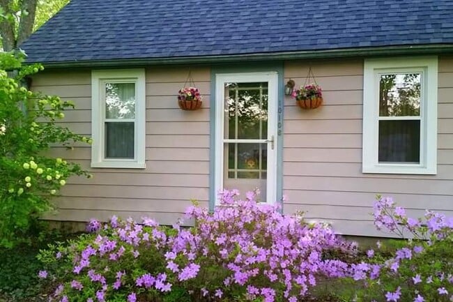 Vintage front door, double pane windows throughout the entire house and the roof has been replaced. - 10106 Wingfield Rd