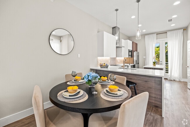 2BR, 2.5BA - 1,200SF - Dining Room - The Merritt Condominiums