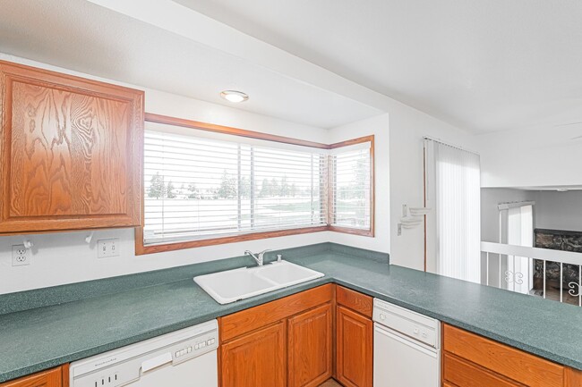 Building Photo - PURE Property Management presents: Beautiful 4 Bedroom Home Near Foxtail Golf Course!