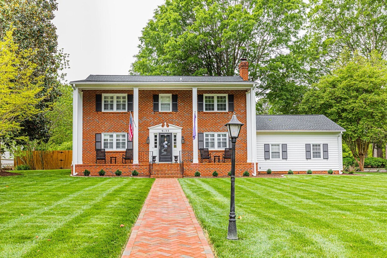 Primary Photo - Spacious and Stylish 4-Bedroom Home with M...