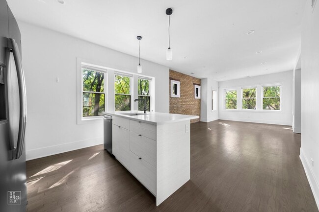 Building Photo - Sunny, Spacious and Beautifully Rehabbed in Avondale with Laundry in-unit