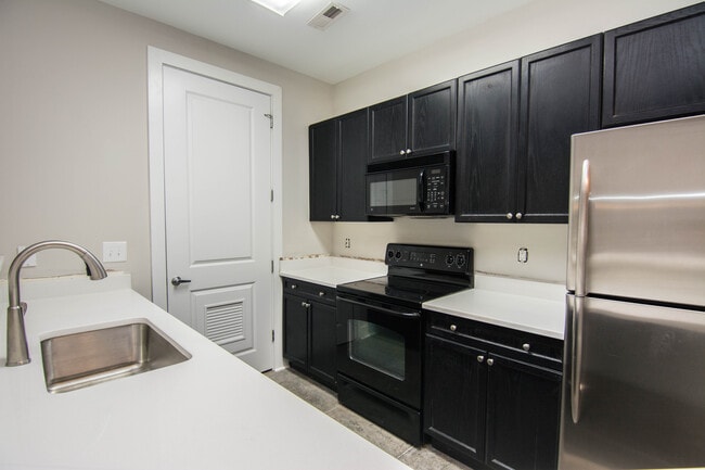 large kitchen w/new quartz - 1101 W 1st St