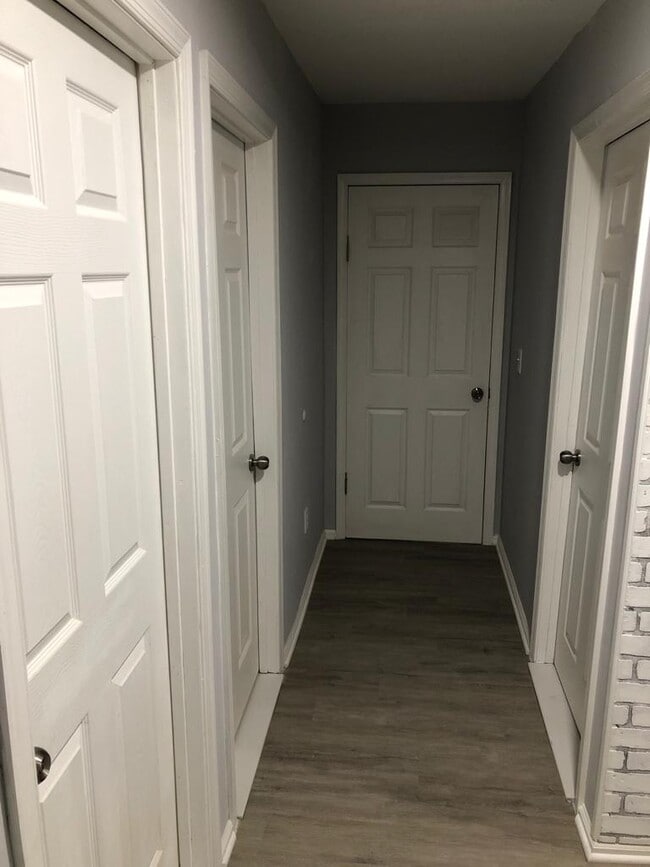 hallway - fresh paint and new flooring - 214 Elm St