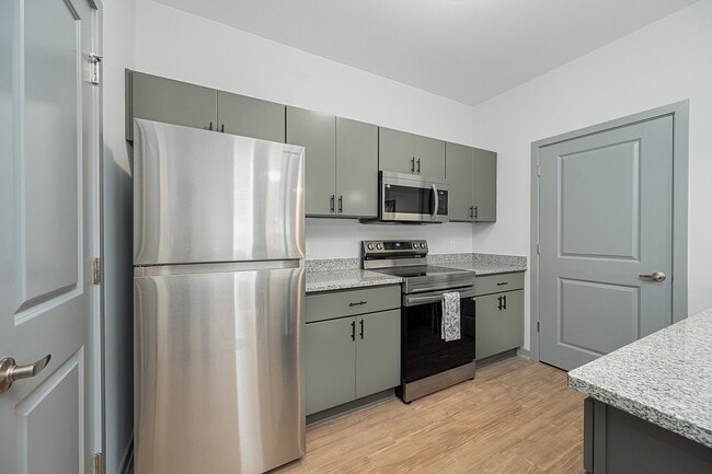 Large Kitchen with Stainless Steel Appliances - The Retreat at Canal Apartments