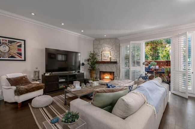 View of charming terrace off the living room with barbeque - 11645 Acama St