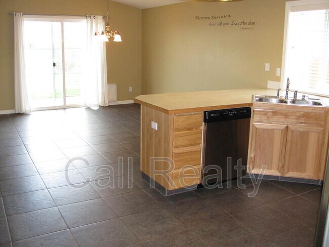 Building Photo - 9302 W Caelen Ave