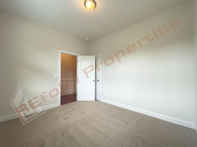 Building Photo - Brand New Carpet and Fresh Paint! Charming...