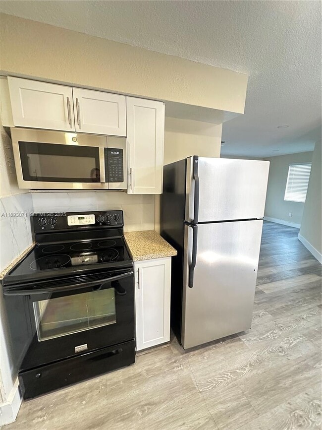 Building Photo - 97 NW 73rd Pl