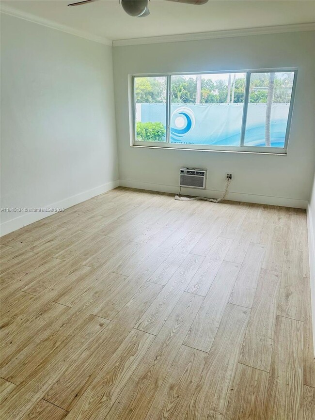 Building Photo - 9281 W Bay Harbor Dr