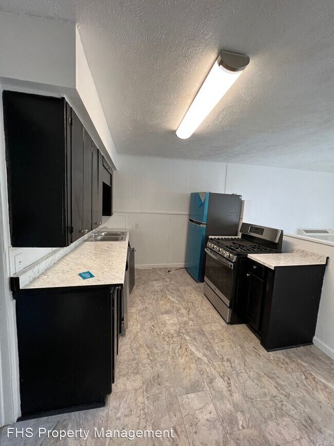 Foto del edificio - 1 br, 1 bath House - 1028 1/2 E Commercial