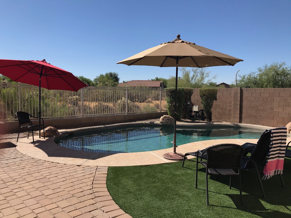 Backyard with private desert view fencing with no neighbors behind. - 4557 E Coyote Washington Dr