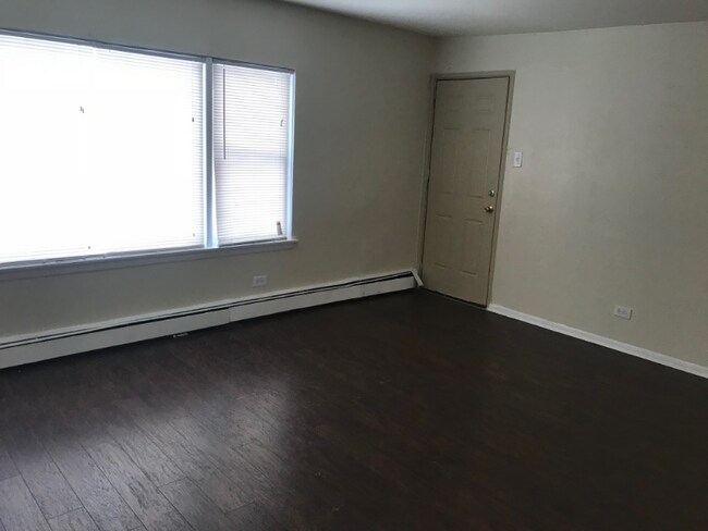 Building Photo - 6435-6437 S Evans Ave