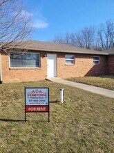 Building Photo - 7092-7094 Manor Dr N