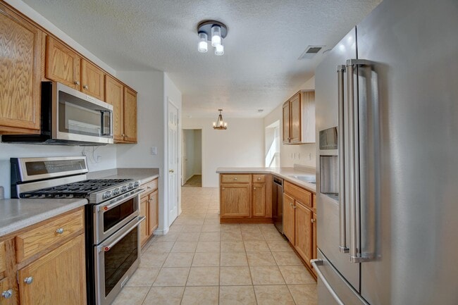 Building Photo - 6808 Candelia Ave NW