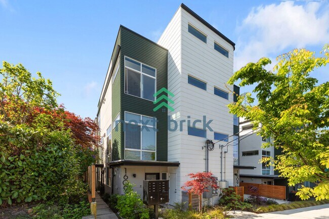 Foto del edificio - Chic Urban Living: 2-Bed, 2-Bath Townhouse Retreat in Seattle's Heart!