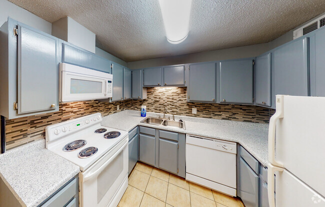 KITCHEN has a tile backsplash - Willow Creek Apartments