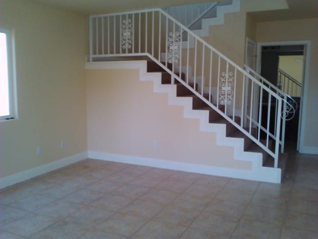 Stairs to second floor - 454 E 47th St